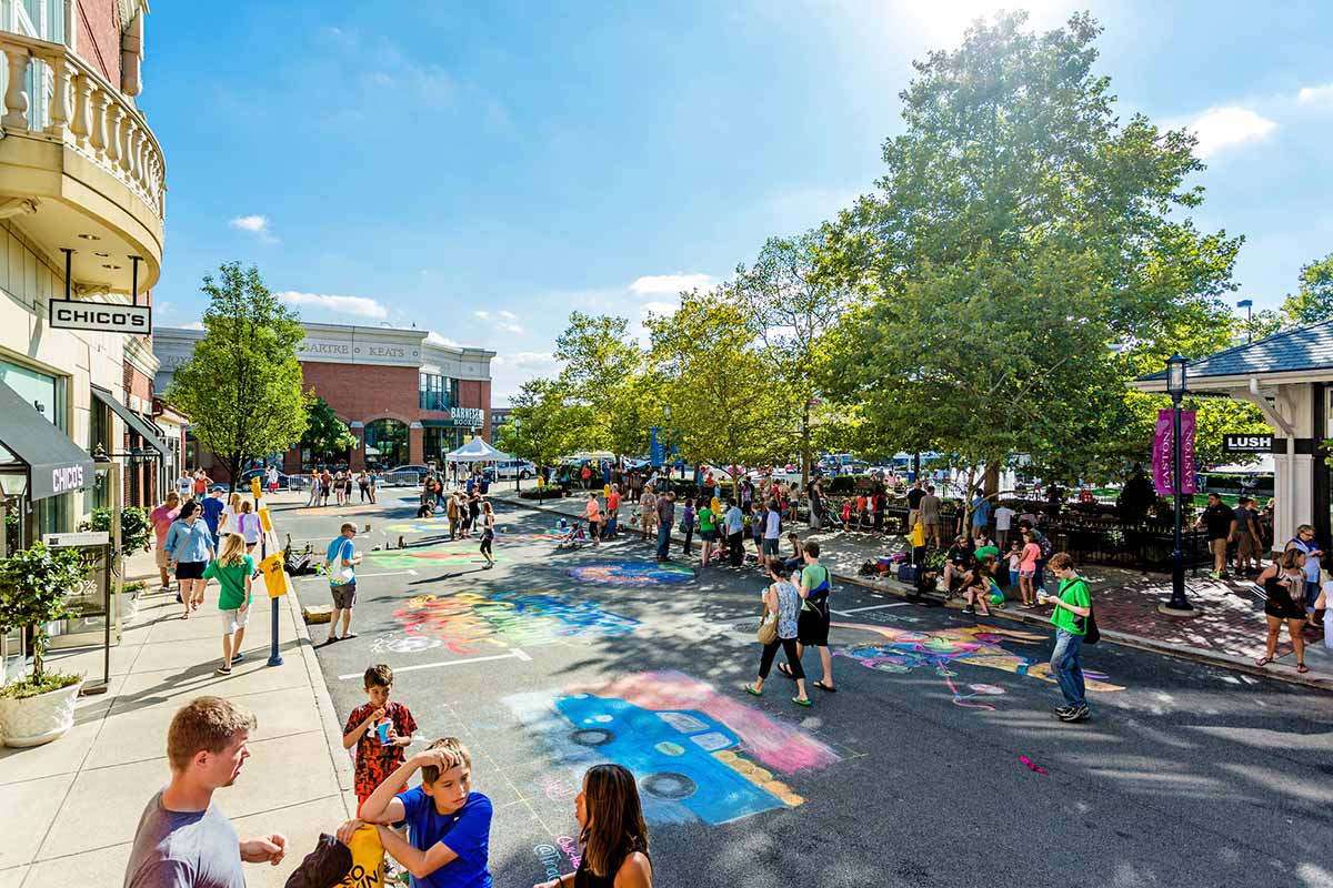 People enjoying sidewalk art at Easton Town Center in Columbus, OH